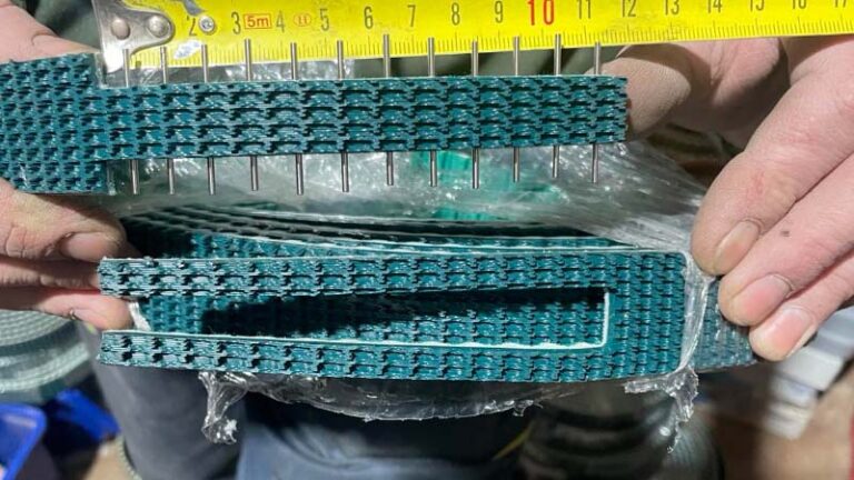 Junta de pasador de correa de distribución